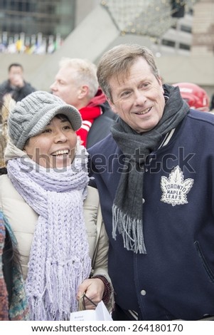 TORONTO,CANADA-JANUARY 1,2015:Toronto Mayor John Tory a in Nathan Phillips Square where he held a skating party and talked to the city inhabitants after taking office in December
