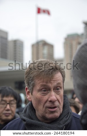 TORONTO,CANADA-JANUARY 1,2015:Toronto Mayor John Tory a in Nathan Phillips Square where he held a skating party and talked to the city inhabitants after taking office in December