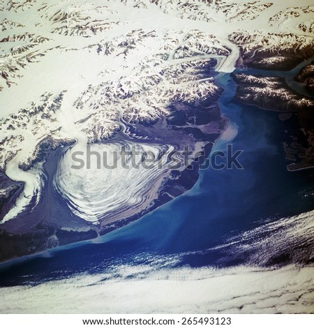 Aerial view of the Hubbard Glacier which is a  glacier located in eastern Alaska and part of Yukon Canada. Elements of this image furnished by NASA.