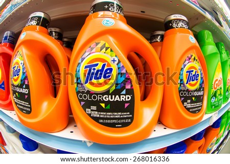 TORONTO,CANADA-APRIL 4,2015: Tide laundry detergent in store shelf.Tide is the brand-name of a laundry detergent manufactured by Procter & Gamble, first introduced in 1946