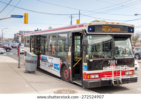 TORONTO,CANADA-APRIL 25,2015:Out of service TTC bus, driver said, it had overheated brake pads due to repeating braking in jam consequence of the Don Valley Parkway closure for Spring maintainance