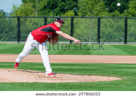 TORONTO,CANADA-JULY 12,2015: Toronto Pan American Games 2015, Baseball tournament: Jared Mortensen Canadian pitcher opens the game vs Colombia Case number - 01953074