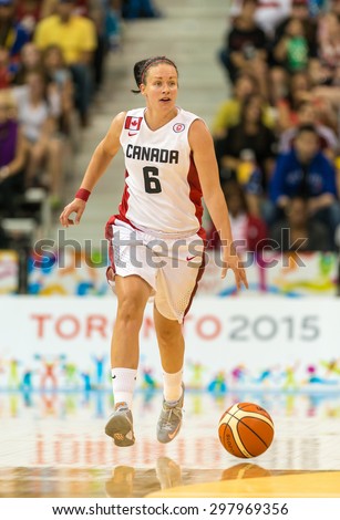 TORONTO,CANADA-JULY 16,2015: Toronto 2015 Pan Am or Pan American Games, women basketball: Shona Thornburn (6) from team Canada start an attack to the opponent court in a swift move.CN 01953074