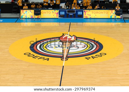 TORONTO,CANADA-JULY 16,2015: Toronto 2015 Pan Am or Pan American Games, basketball: The Odepa or Paso logo in the center of the basteball court.CN 01953074