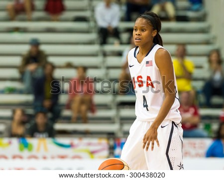 TORONTO,CANADA-JULY 20,2015: Toronto 2015 Pan Am or Pan American Games, women basketball: Moriah Jefferson calms and organize the United States game while advancing to the Brazil area.