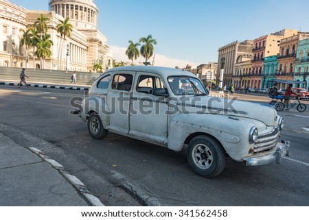 HAVANA,CUBA-JULY 3,2015: Real life use of obsolete vehicles in 2015. Cuba is known for the beautiful classic American cars still running. Although dangerous sometimes, it is a tourist attraction