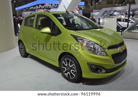 TORONTO-FEBRUARY 25: Exhibition of the Chevrolet Spark during  the Canadian International Auto Show in  the Toronto Convention Centre on February 25, 2012. This time the show arrives to 38 years.
