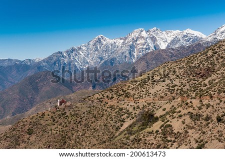 A small hotel by a narrow road high in the Atlas Mountains in Morocco.
