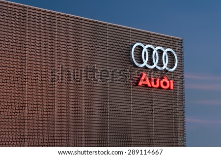 EDINBURGH, SCOTLAND - DECEMBER 09, 2012:Audi logo sign on showroom premises photographed before dawn on 09 December 2012 in Edinburgh.