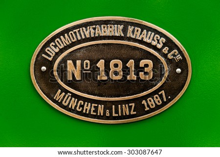CHIEMSEE, GERMANY - MAY 23, 2013: Maker and identity plate on vintage narrow gauge steam train at Chiemsee, Chiemgau in Bavaria, Germany.