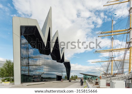 GLASGOW, SCOTLAND - SEPTEMBER 03 2015: The Riverside Museum Glasgow, Scotland. The museum has some of the world\'s finest cars, bicycles, ship models and locomotives formerly in the Transport Museum.