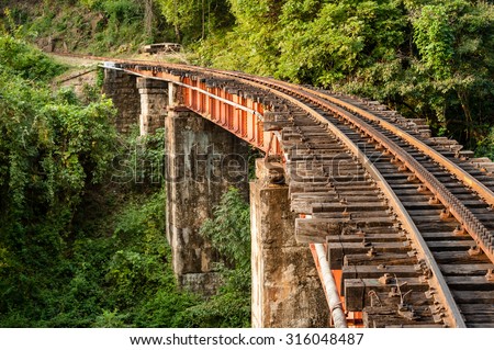 Section of the track and a bridge on the Nilgiri mountain railway at Mettupalayam.  The rack and pinion railway runs between Mettupalayam and Udagamandalam also known at Ooty, in South India.