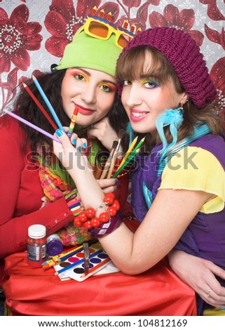 Best friends. Two young artist's with with drawing tools