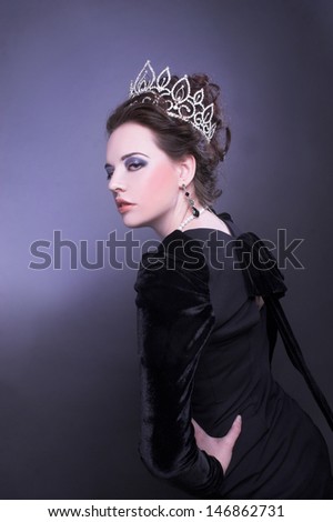 Queen. Young lady posing in crown.