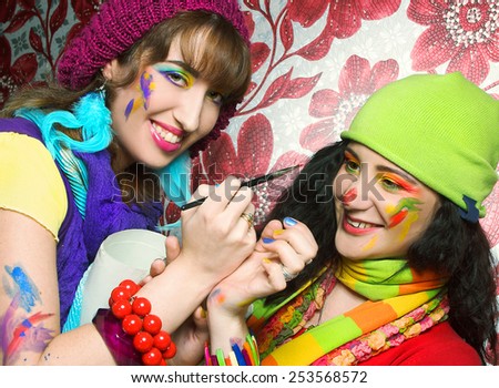 Best friends. Two young artist\'s with with drawing tools