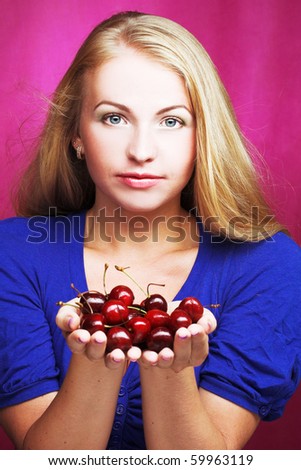 Portrait of young woman with cherry's