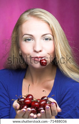 Portrait of young woman with cherry\'s