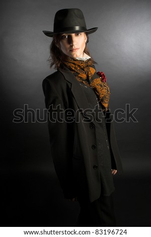 Portrait of young woman in men 39s suit