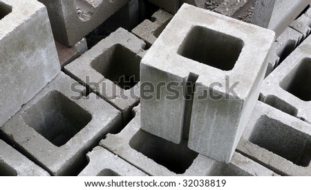 Stack of cinder blocks at a construction site.