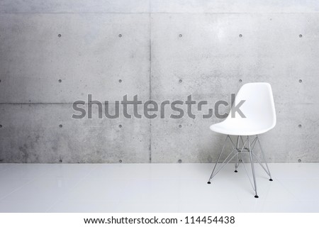 Modern White Chair And Concrete Wall