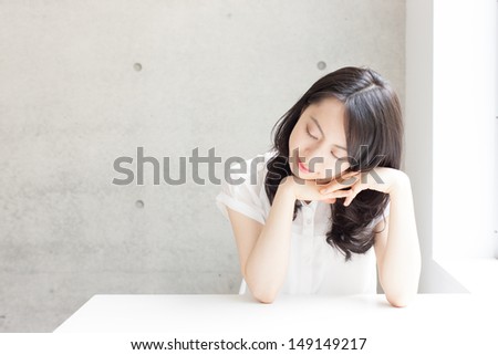 beautiful young woman taking a nap