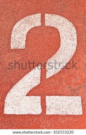 Number two on the start of a running track - check my portfolio for other numbers