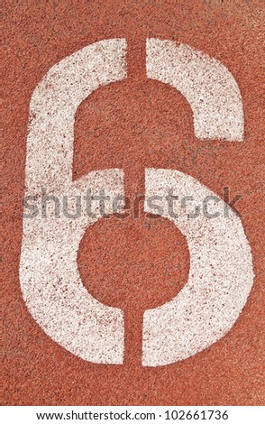 Number six on the start of a running track - check my portfolio for other numbers