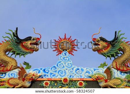Dragon Statue Chinese temple roof.
