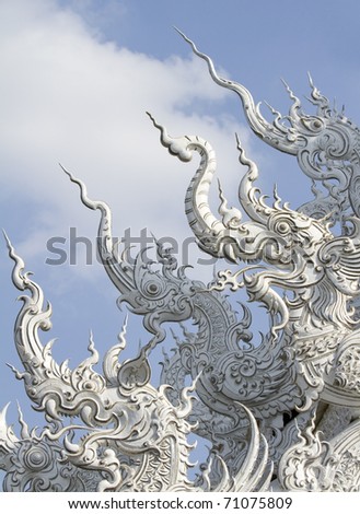 Top part decoration of famous white church in Wat Rong Khun, Chiang Rai, north of Thailand