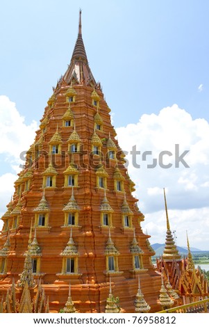 Form of the pagoda in the temple Thai Thailand against the backdrop of the sky.