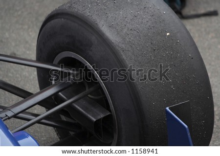 stock-photo-a-slick-tyre-on-the-racing-car-1158941.jpg