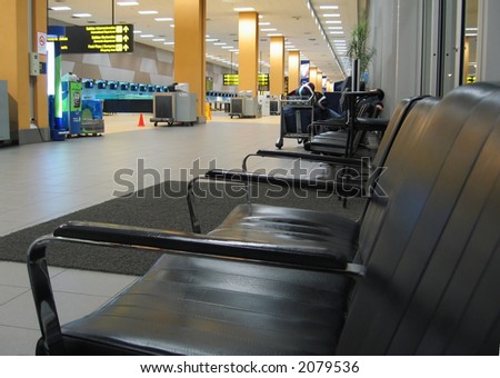 Black arm-chair in airport