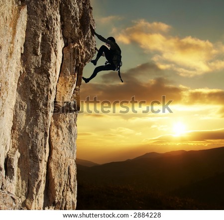 stock photo Rock Climber