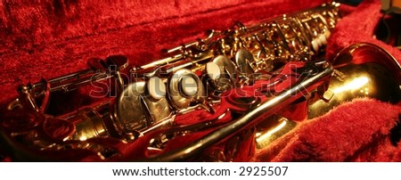 Saxophone in red bag