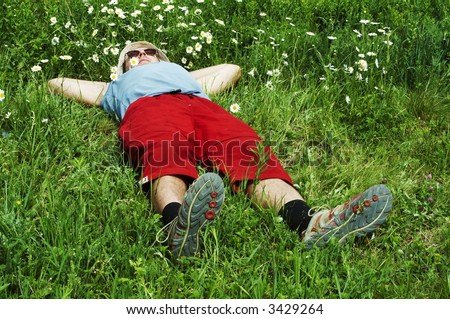 Relaxing man in the grass