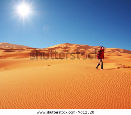 man go  in sand desert