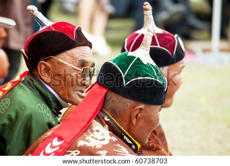 MOON SUM, MONGOLIA - JULY 25: arbiters of traditional mongolian fighting festival on July 25, 2010 in Moon Sum, Mongolia. Annual holiday in honor of town birthday.