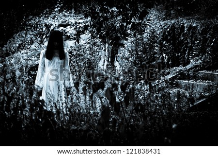 Horror scene of a scary woman. Apparitions of the female ghost.