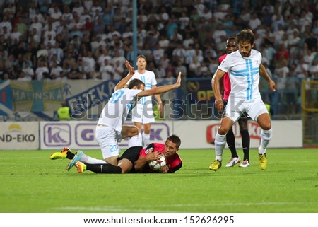RIJEKA, CROATIA SEPTEMBER 2: soccer derby match NK Rijeka (white) vs. NK Lokomotiva (black-pink) on September 2, 2013 in Rijeka.