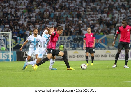 RIJEKA, CROATIA SEPTEMBER 2: soccer derby match NK Rijeka (white) vs. NK Lokomotiva (black-pink) on September 2, 2013 in Rijeka.