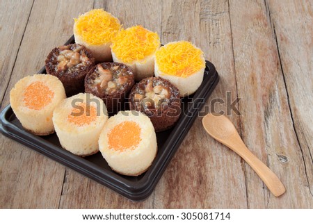 bakery product on wooden background,Small cakes