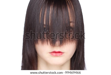 Close up of woman with long black haired fringe