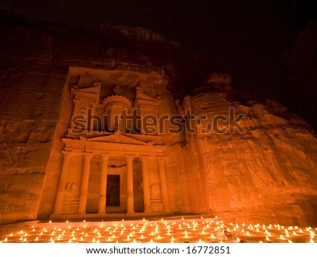 stock photo Treasury at Petra Jordan lit by candle under the stars