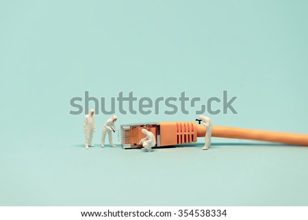 Specialists with network cable. Macro photo