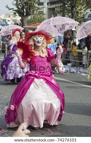 LIMASSOL, CYPRUS - FEBRUARY 14: Man disguised in a woman dress at Carnival Parade on February 14, 2010 in Limassol, Cyprus.