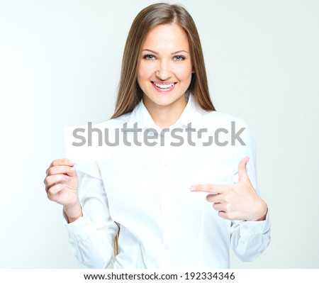 happy smiling successful business woman holding blank credit visit card. beautiful woman.