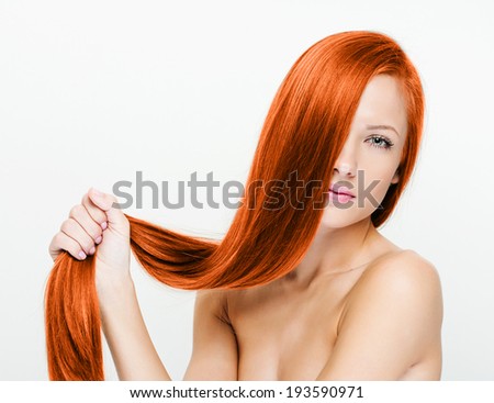Woman with beauty long red hair