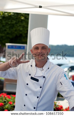 young chef catering an outdoor event in coeur d alene idaho, july 4