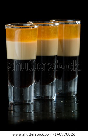 b 52 shots layered and served on a isolated black background
