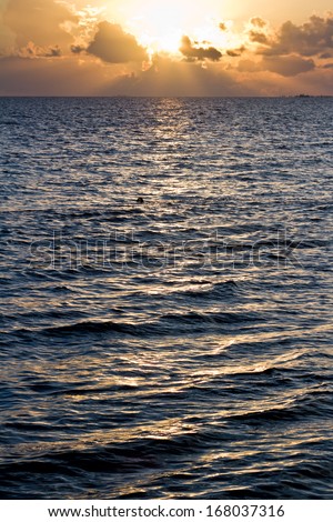 Beautiful tranquil beach sun rise in southern Belize